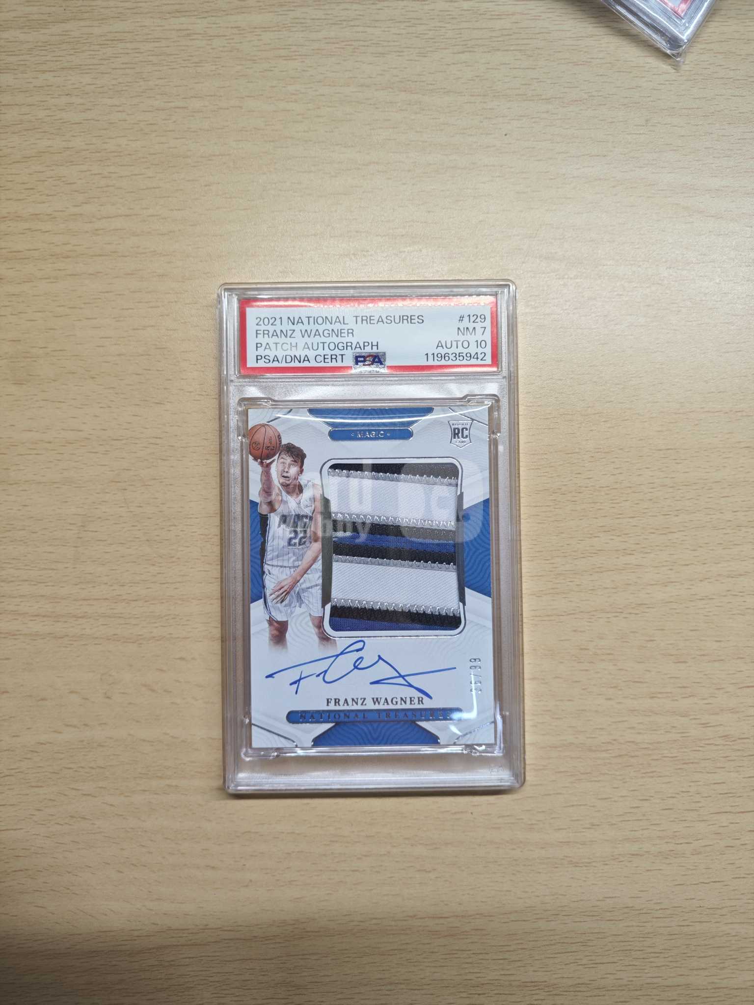 Franz Wagner 2021-22 National Treasures Rookie Patch Autograph numbered to 99 basketball card