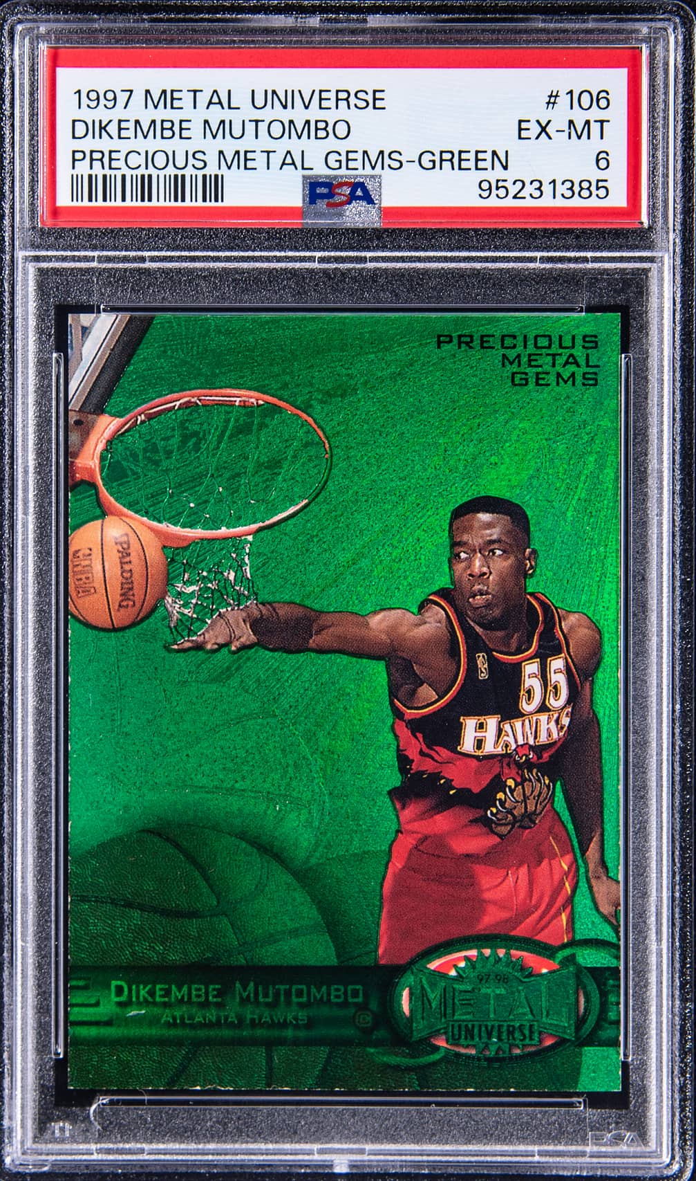Dikembe Mutombo 1997-98 SkyBox Metal Universe Precious Metal Gems (PMG) Green #106 Dikembe Mutombo (#005/100) - PSA EX-MT 6 basketball card